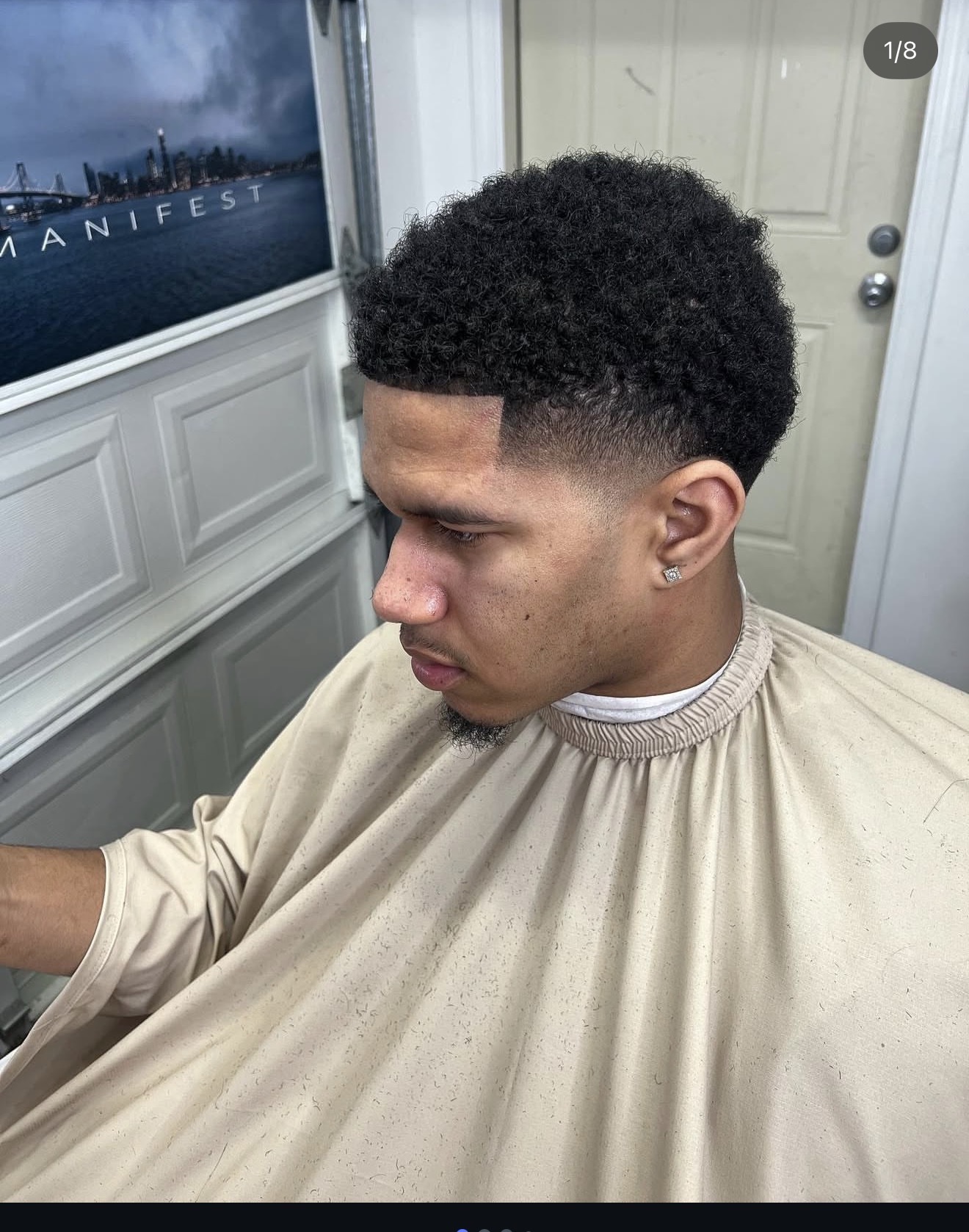 Afro blowout with low taper fade by Sharp Society Barbershop Bay Area