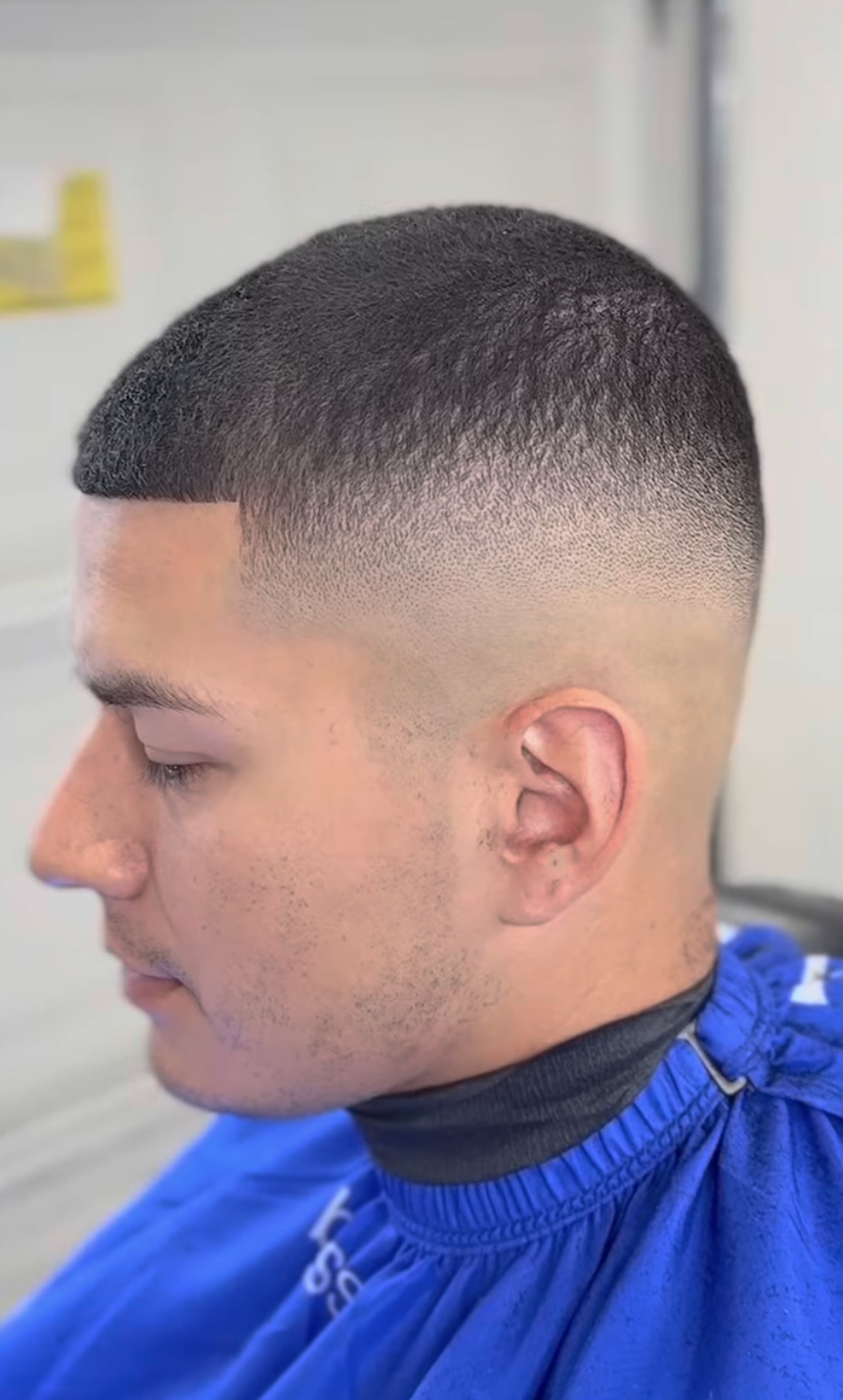High skin fade buzz cut by Sharp Society Barbershop barber Richmond CA